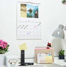 Load image into Gallery viewer, photo of personalised photo calendar in a4 sizing by desk
